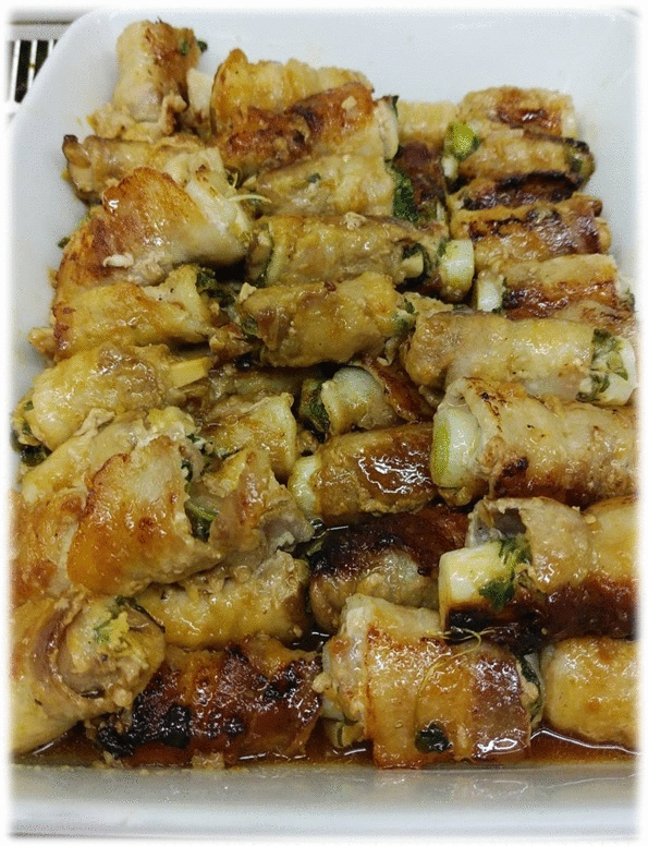豚肉の野菜巻き焼き・大根とがんもの煮物・イカと小松菜の炒め物・ホーレン草のサラダ